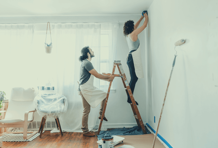 Mistakes Homeowners Make When Selling - couple making cosmetic repairs
