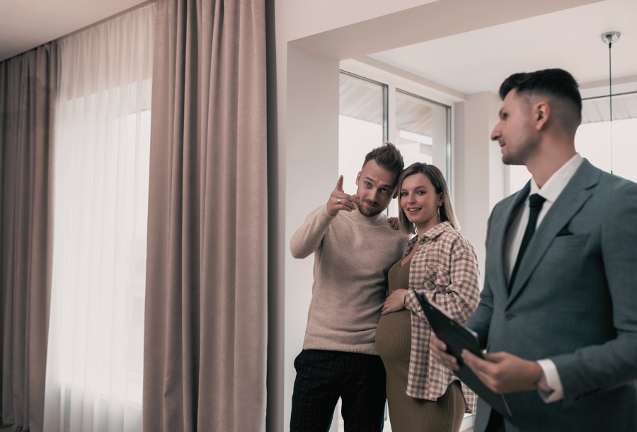 Sell Your Property Fast - couple viewing house with agent