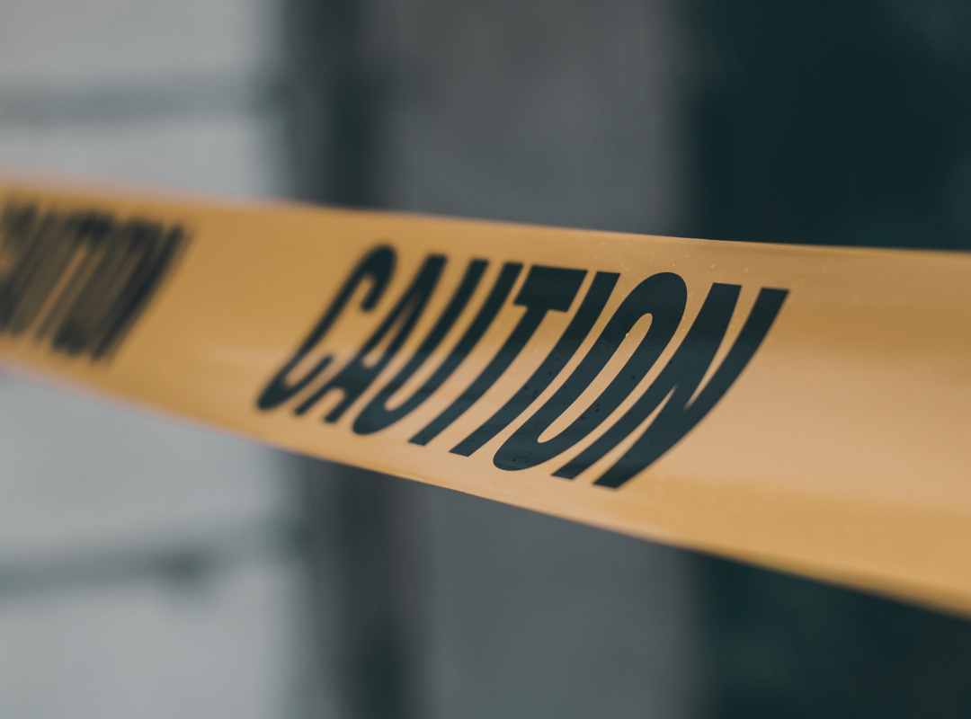 We Buy Homes - caution sign