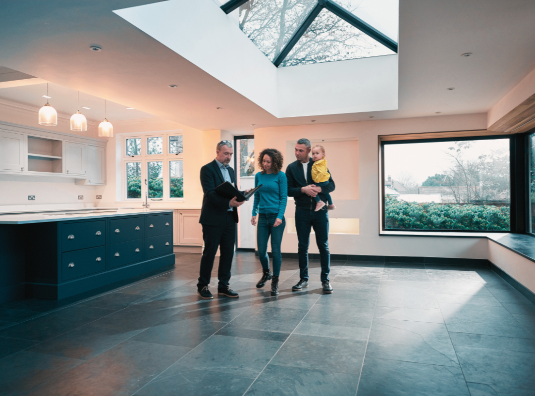 Sell your property online - family and estate agent at a house viewing