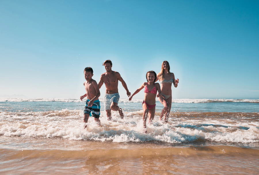 How to sell a house - family on a beach holiday